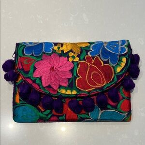 Floral Embroidered Clutch with Pom Poms